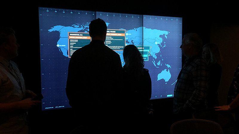 Users interacting with War Room screen