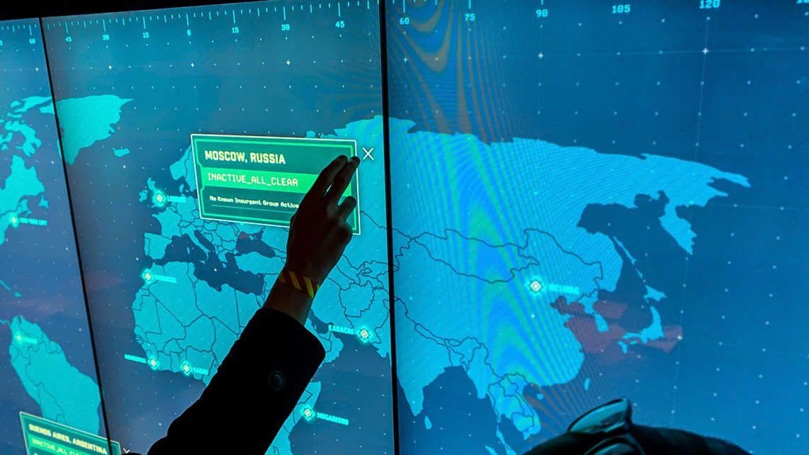 User touching War Room screen